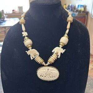 Vintage carved natural ivory bone elephant necklace pendant bezel set sterling.